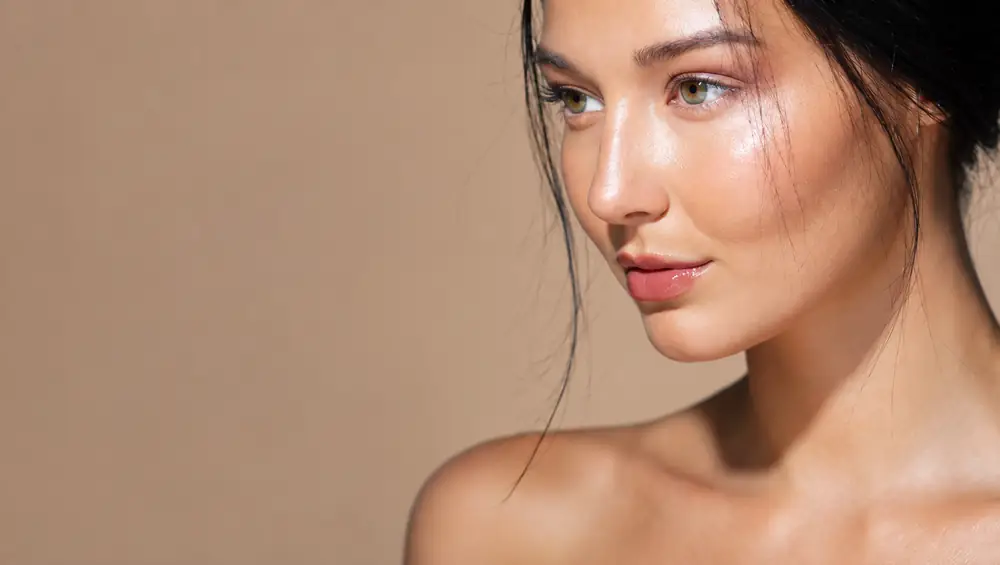 Woman with radiant, hydrated skin